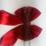 Handmade large red satin bows, 11cm wide, perfect for gift wrapping and decorations.