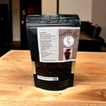 Homemade Chinese Chilli Paste on a kitchen counter with fresh red chillies and spices
